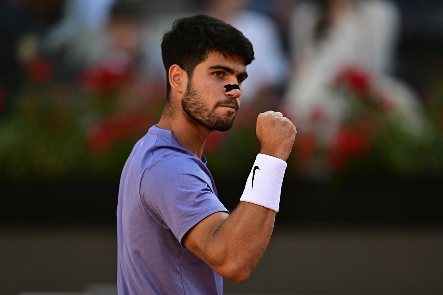 Carlos Alcaraz wearing a nasal strip to improve his breathing