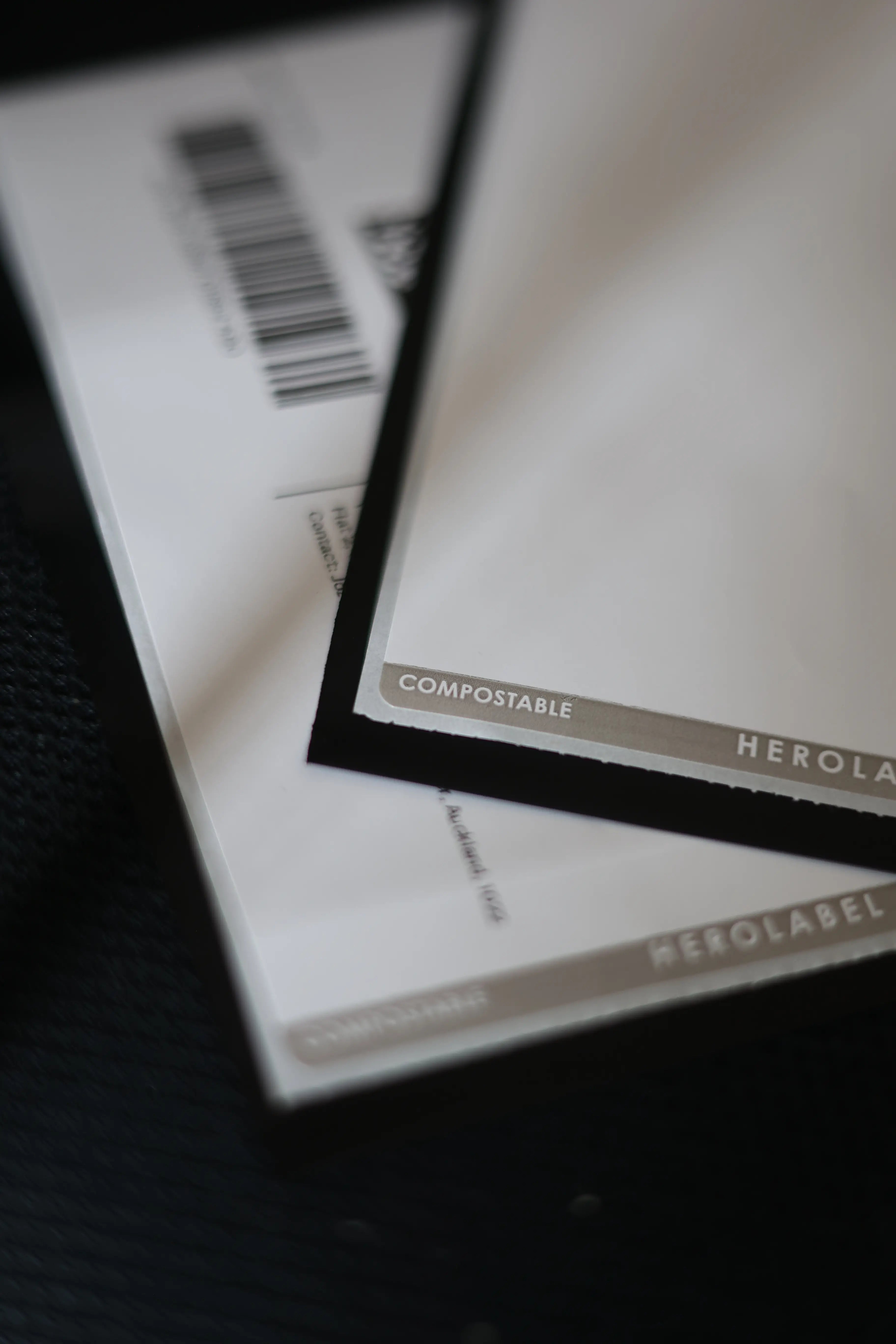 Close-up of BREATHMODE compostable shipping labels, part of its eco mission for a sustainable nasal strip industry