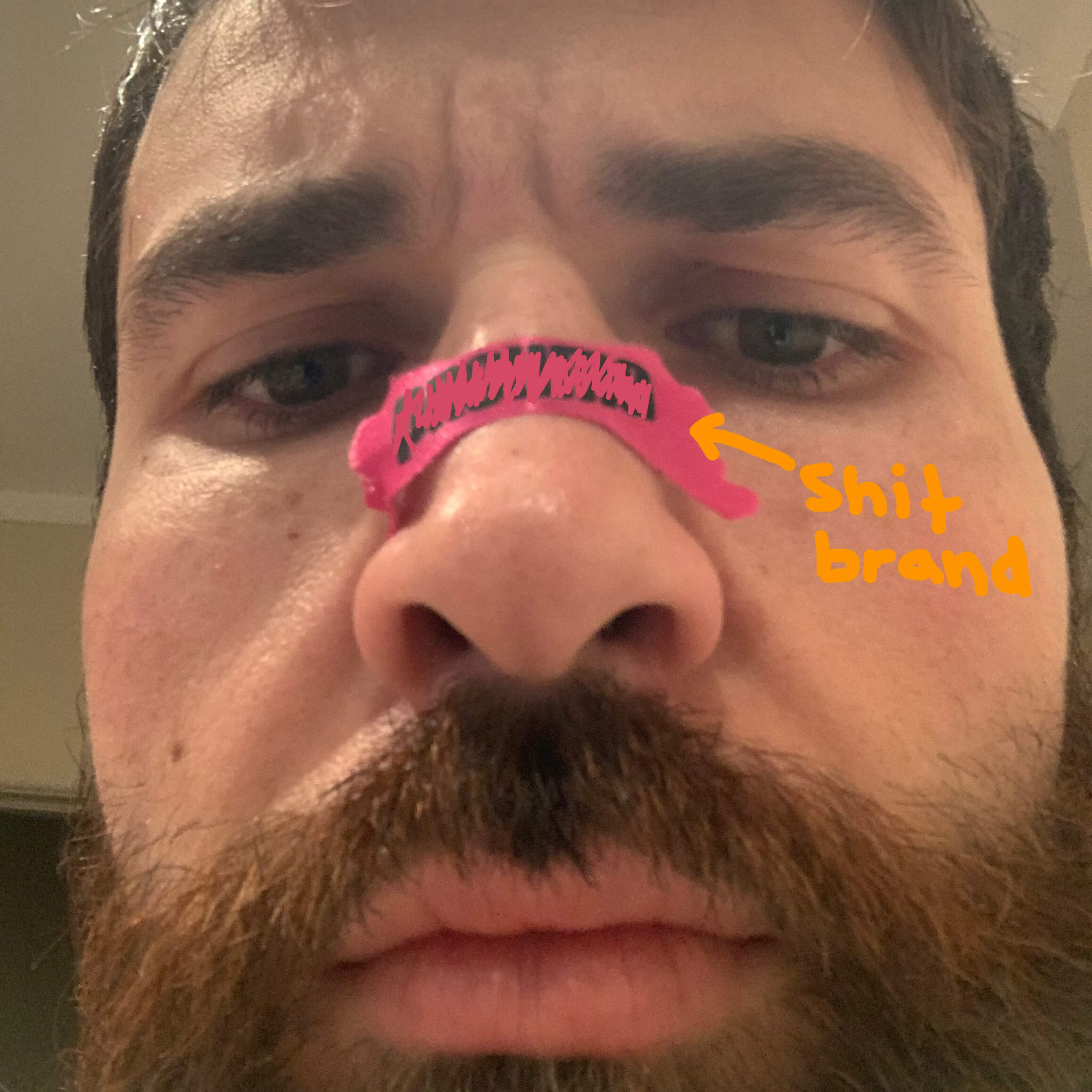 A current photo of BREATHMODE founder, Jozef Wright, testing out a bad quality 'Big Nasal Strip' competitor brand avaliable in New Zealand