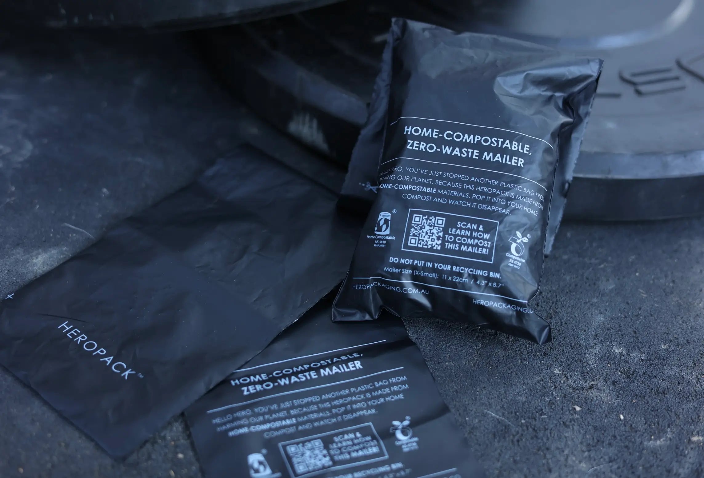 Home-compostable zero-waste mailers with HEROPACK branding for the BREATHMODE nasal strips brand