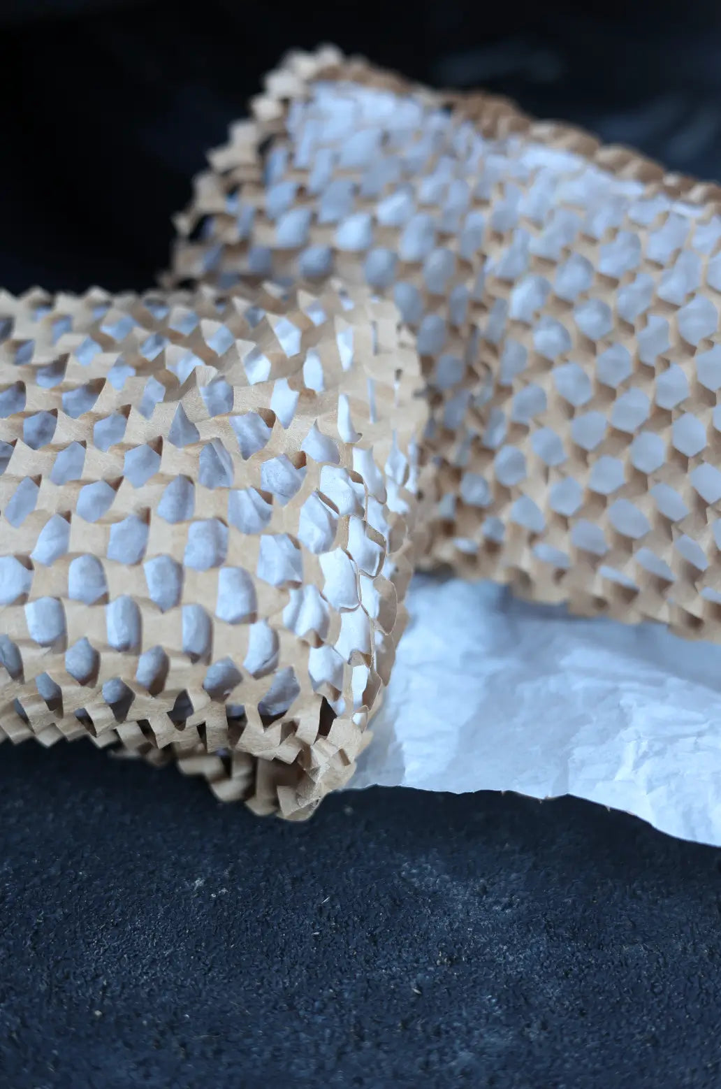 The BREATHMODE nasal strips packaging paper that is home compostable, highlighting the eco mission